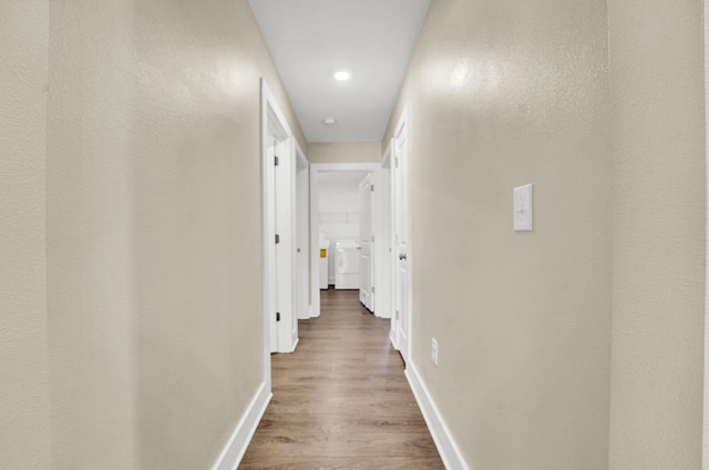 262 Bayou Bend Ln, Panama City, FL 32404 - corridor with wood finished floors, baseboards, and recessed lighting