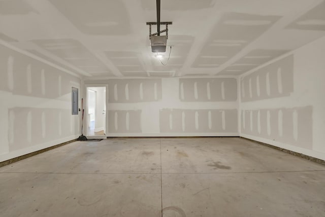 262 Bayou Bend Ln, Panama City, FL 32404 - garage with electric panel, a garage door opener, and baseboards