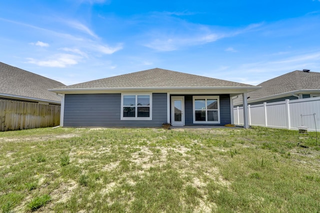 262 Bayou Bend Ln, Panama City, FL 32404 - back of property with a shingled roof
