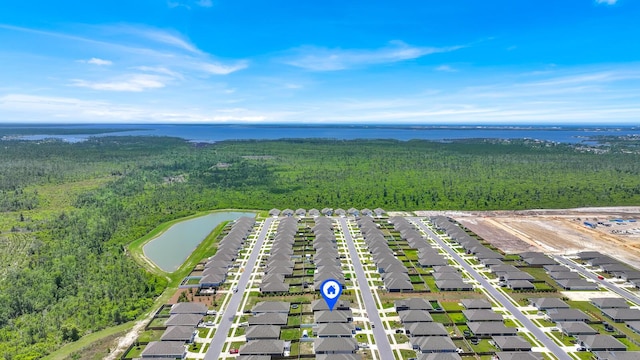 262 Bayou Bend Ln, Panama City, FL 32404 - aerial view of residential area featuring a heavily wooded area and a large body of water