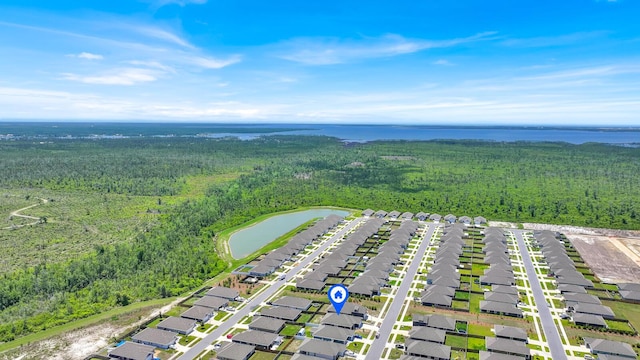 262 Bayou Bend Ln, Panama City, FL 32404 - aerial perspective of suburban area with a heavily wooded area and a nearby body of water