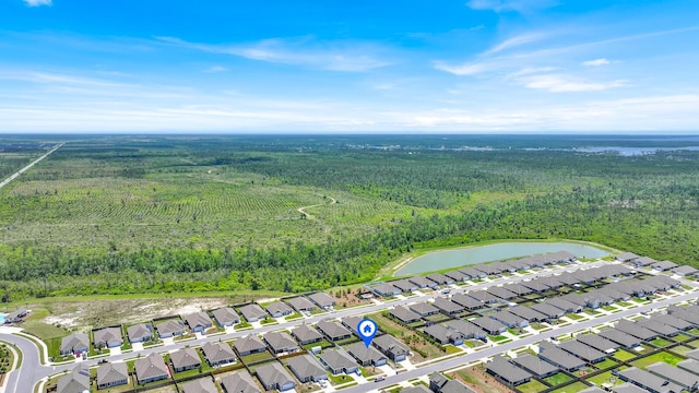 262 Bayou Bend Ln, Panama City, FL 32404 - aerial view of property and surrounding area featuring a heavily wooded area, a nearby body of water, and nearby suburban area