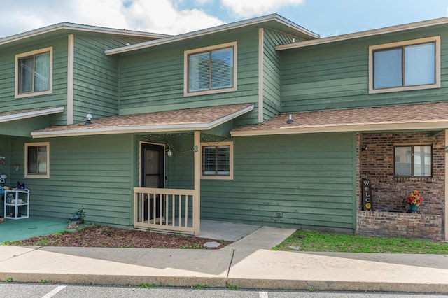 115 NE Hughes St Unit B3, Fort Walton Beach, FL 32548 - view of front of property with a shingled roof