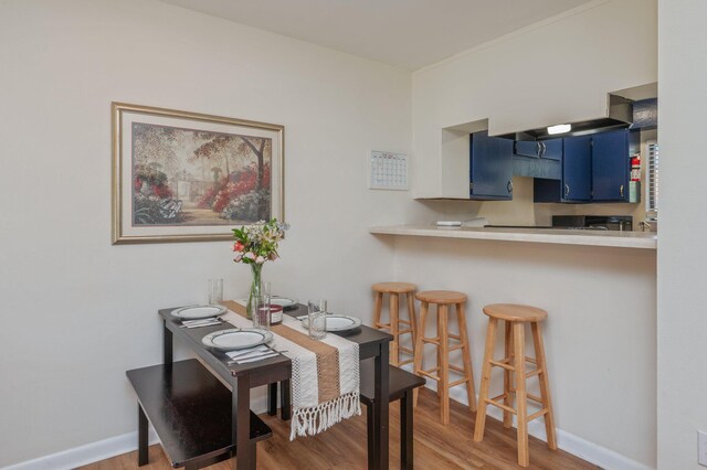 115 NE Hughes St Unit B3, Fort Walton Beach, FL 32548 - dining area featuring wood finished floors and baseboards