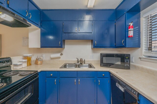 115 NE Hughes St Unit B3, Fort Walton Beach, FL 32548 - kitchen featuring black appliances, a sink, light countertops, and blue cabinetry