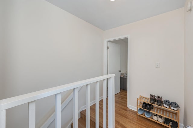 115 NE Hughes St Unit B3, Fort Walton Beach, FL 32548 - hallway featuring light wood-style flooring and baseboards
