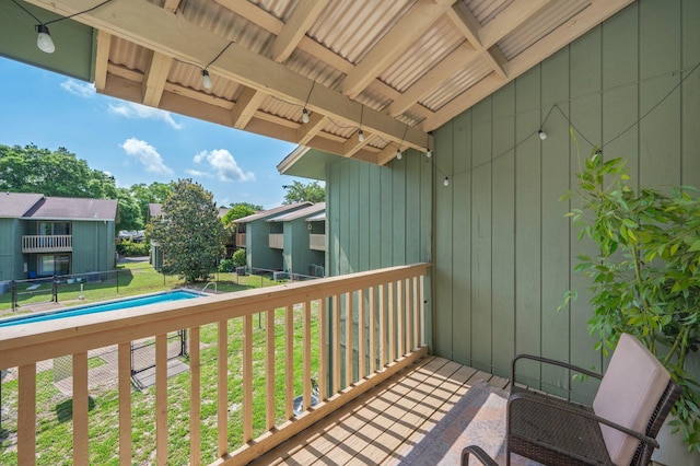 115 NE Hughes St Unit B3, Fort Walton Beach, FL 32548 - wooden deck featuring an outdoor pool and a lawn