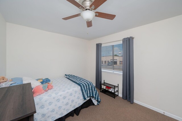 115 NE Hughes St Unit B3, Fort Walton Beach, FL 32548 - bedroom featuring carpet floors, baseboards, and ceiling fan