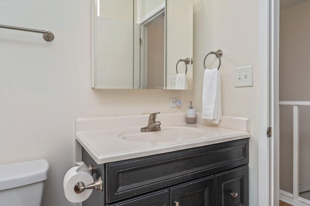 115 NE Hughes St Unit B3, Fort Walton Beach, FL 32548 - half bathroom featuring toilet and vanity