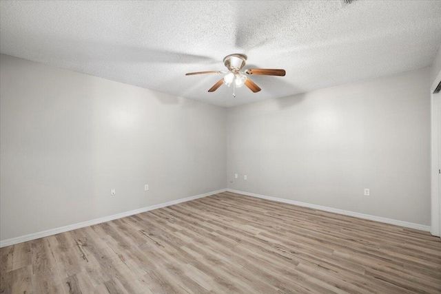1008 Aspen Ct, Fort Walton Beach, FL 32547 - empty room featuring a ceiling fan, light wood-type flooring, baseboards, and a textured ceiling