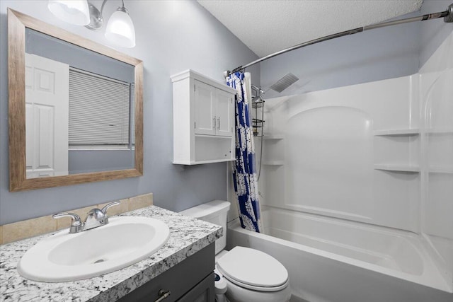 1008 Aspen Ct, Fort Walton Beach, FL 32547 - bathroom featuring toilet, shower / bath combination with curtain, a textured ceiling, and vanity