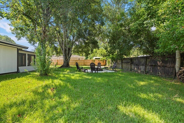 1008 Aspen Ct, Fort Walton Beach, FL 32547 - view of yard featuring an outdoor fire pit