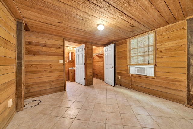 891 Choctawhatchee River Rd, Ponce De Leon, FL 32455 - unfurnished bedroom featuring wooden ceiling, wooden walls, light tile patterned flooring, and cooling unit