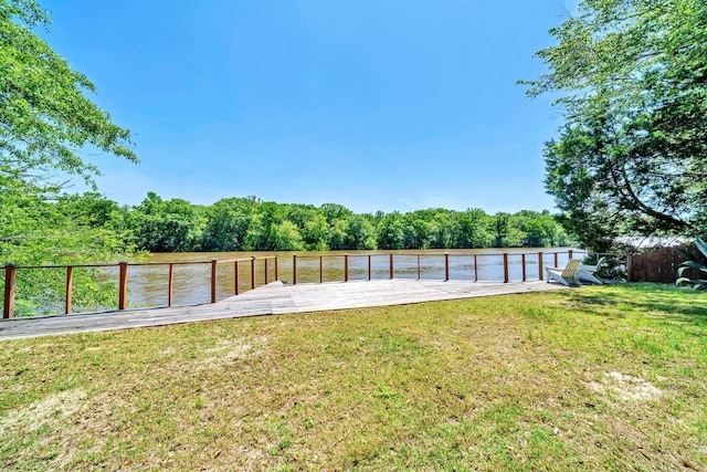 891 Choctawhatchee River Rd, Ponce De Leon, FL 32455 - view of grassy yard with a wooden deck and a wooded view
