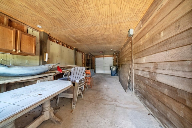 891 Choctawhatchee River Rd, Ponce De Leon, FL 32455 - misc room with concrete flooring and wood walls