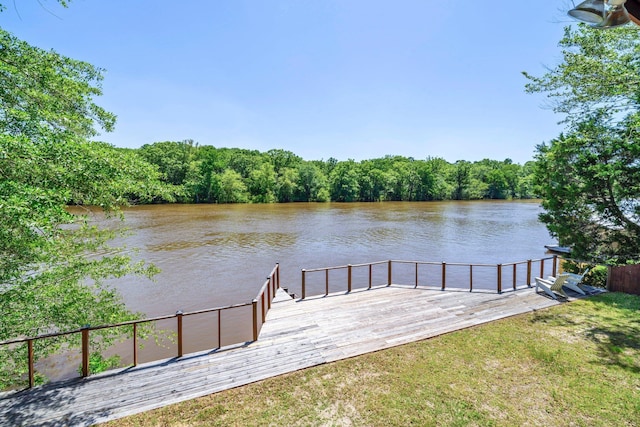 891 Choctawhatchee River Rd, Ponce De Leon, FL 32455 - dock with a water view, a view of trees, and a lawn