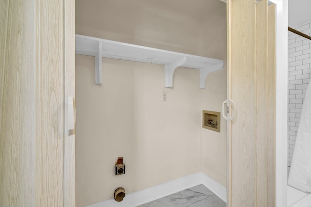 891 Choctawhatchee River Rd, Ponce De Leon, FL 32455 - laundry area featuring hookup for a washing machine, marble look tiles, electric dryer hookup, and baseboards