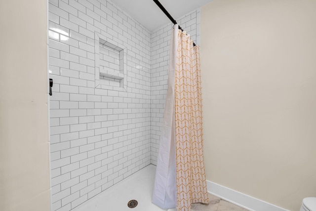 891 Choctawhatchee River Rd, Ponce De Leon, FL 32455 - full bath with a shower stall, baseboards, marble finish floors, and toilet