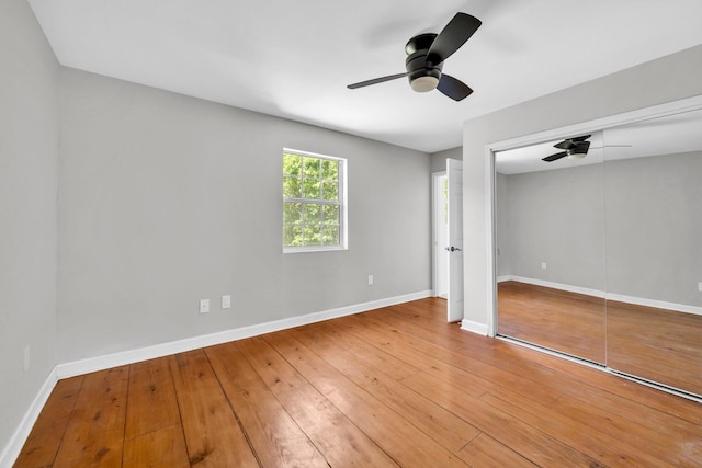 891 Choctawhatchee River Rd, Ponce De Leon, FL 32455 - unfurnished bedroom with baseboards, a ceiling fan, hardwood / wood-style floors, and a closet