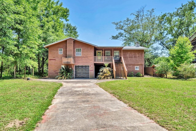 891 Choctawhatchee River Rd, Ponce De Leon, FL 32455 - chalet / cabin with driveway, stairway, a garage, and a front lawn