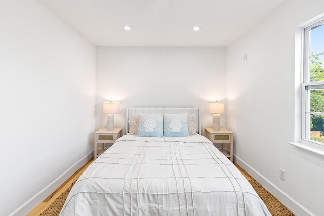 43 Summer Haven Trl Unit 3, Miramar Beach, FL 32550 - bedroom with baseboards, multiple windows, recessed lighting, and wood finished floors