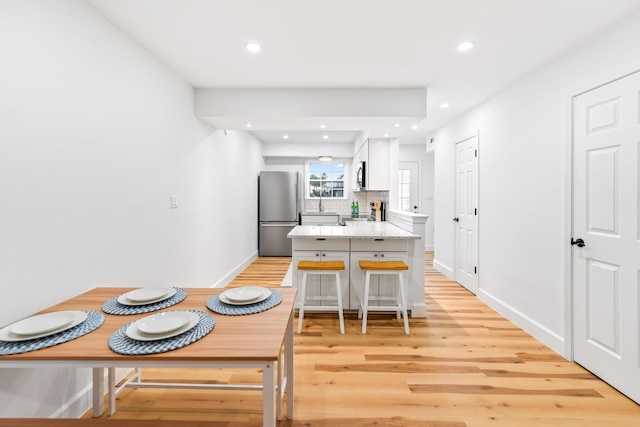 43 Summer Haven Trl Unit 3, Miramar Beach, FL 32550 - dining space with light wood-style floors, recessed lighting, and baseboards