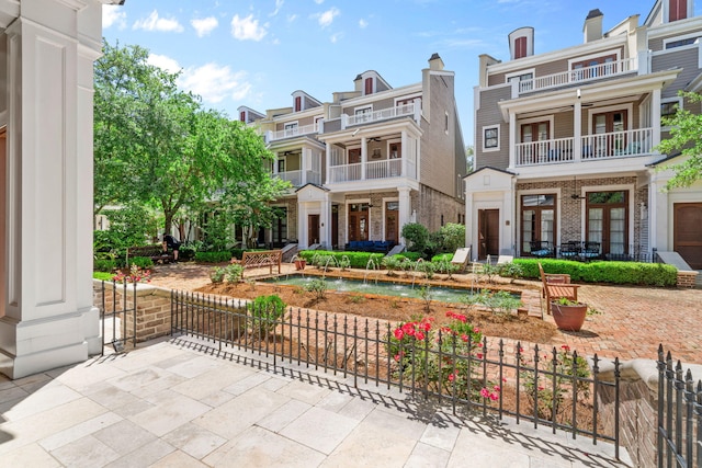 9201 Market St Inn Unit 159, Miramar Beach, FL 32550 - view of front of home with a balcony and a patio