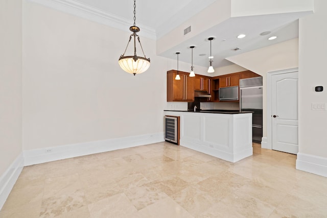 9201 Market St Inn Unit 159, Miramar Beach, FL 32550 - kitchen with built in refrigerator, wine cooler, crown molding, dark countertops, and under cabinet range hood