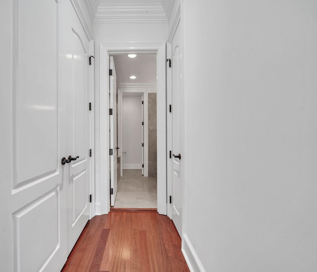 9201 Market St Inn Unit 159, Miramar Beach, FL 32550 - hallway featuring crown molding, wood finished floors, recessed lighting, and baseboards