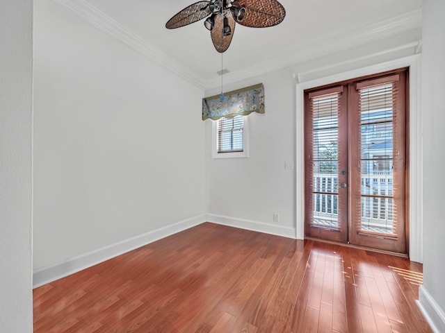 9201 Market St Inn Unit 159, Miramar Beach, FL 32550 - spare room with french doors, ceiling fan, wood finished floors, crown molding, and baseboards