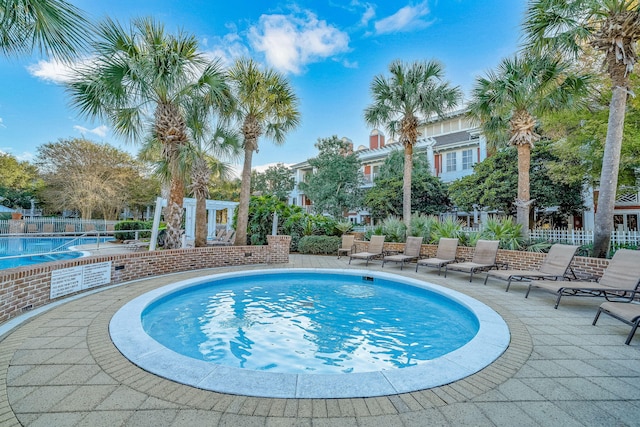 9201 Market St Inn Unit 159, Miramar Beach, FL 32550 - community pool with a patio
