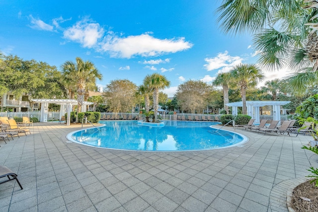 9201 Market St Inn Unit 159, Miramar Beach, FL 32550 - community pool with a pergola and a patio area
