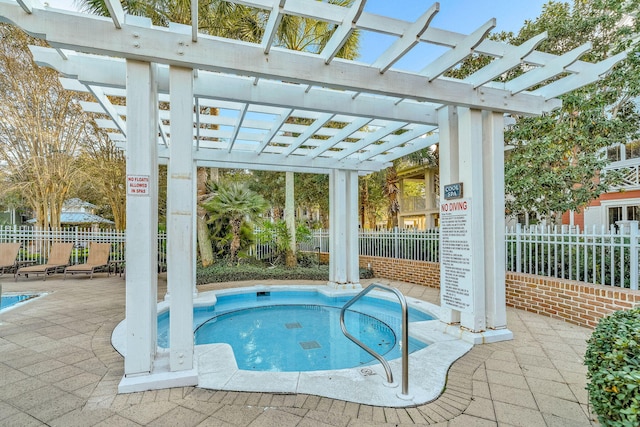 9201 Market St Inn Unit 159, Miramar Beach, FL 32550 - view of swimming pool with a pergola and a patio