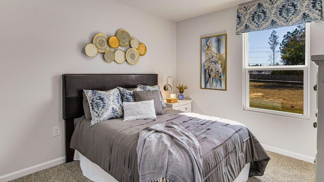 3064 Heritage Plantation Blvd, Laurel Hill, FL 32567 - bedroom with carpet flooring and baseboards