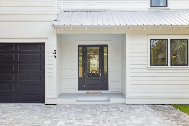 55 May Dr, Santa Rosa Beach, FL 32459 - property entrance featuring metal roof