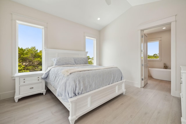 55 May Dr, Santa Rosa Beach, FL 32459 - bedroom featuring light wood-style flooring, vaulted ceiling, baseboards, and recessed lighting