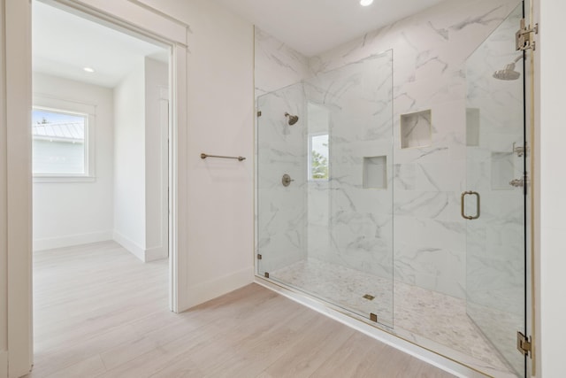 55 May Dr, Santa Rosa Beach, FL 32459 - full bathroom with wood finished floors, a marble finish shower, recessed lighting, and baseboards