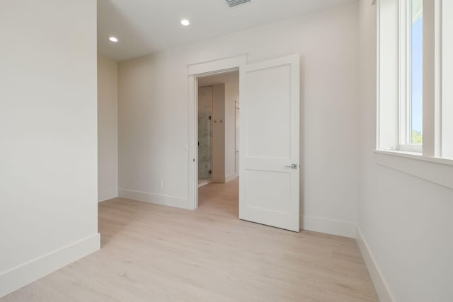 55 May Dr, Santa Rosa Beach, FL 32459 - spare room featuring baseboards, light wood-style flooring, and recessed lighting