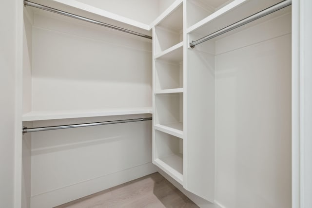 55 May Dr, Santa Rosa Beach, FL 32459 - walk in closet featuring light wood-style flooring