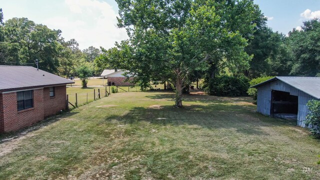 1737 S County Highway 183, Defuniak Springs, FL 32435 - view of yard with an outbuilding