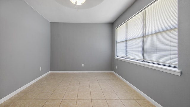 1737 S County Highway 183, Defuniak Springs, FL 32435 - empty room featuring ceiling fan, light tile patterned floors, and baseboards