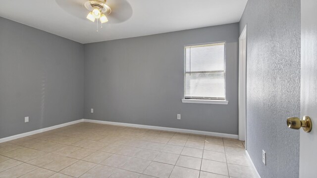 1737 S County Highway 183, Defuniak Springs, FL 32435 - unfurnished room with ceiling fan, light tile patterned floors, and baseboards