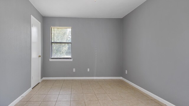 1737 S County Highway 183, Defuniak Springs, FL 32435 - unfurnished room with light tile patterned floors and baseboards