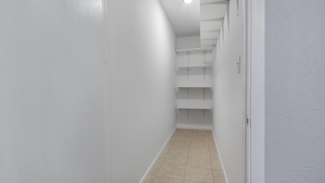 1737 S County Highway 183, Defuniak Springs, FL 32435 - walk in closet featuring light tile patterned floors