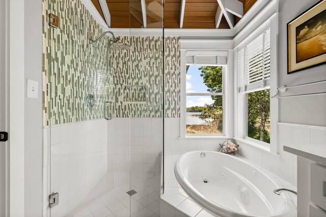 108 S Blue Heron Dr, Santa Rosa Beach, FL 32459 - full bath featuring a stall shower, a jetted tub, and a water view