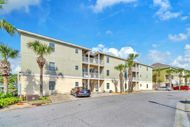 216 Bonita Cir Unit C, Panama City Beach, FL 32408 - view of apartment building / complex with uncovered parking