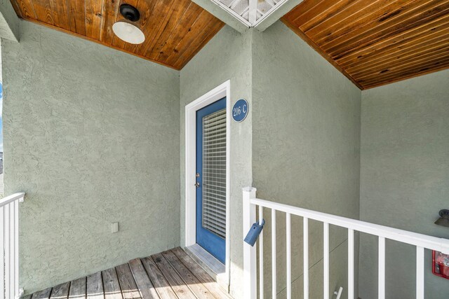 216 Bonita Cir Unit C, Panama City Beach, FL 32408 - doorway to property with stucco siding