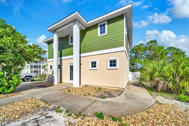 216 Bonita Cir Unit C, Panama City Beach, FL 32408 - view of front of home with stucco siding