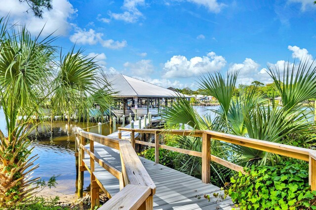 216 Bonita Cir Unit C, Panama City Beach, FL 32408 - dock area with boat lift and a water view