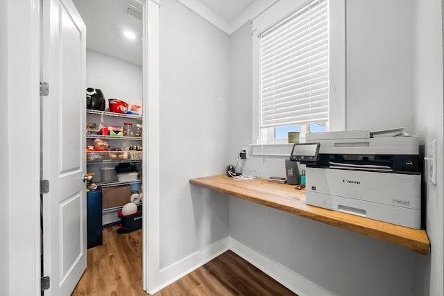 3204 Airport Rd, Panama City, FL 32405 - home office with wood finished floors and baseboards